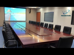 Zmotoryzowany chowany monitor zintegrowany z konferencyjną jednostką dyskusyjną, mikrofon jest chowany